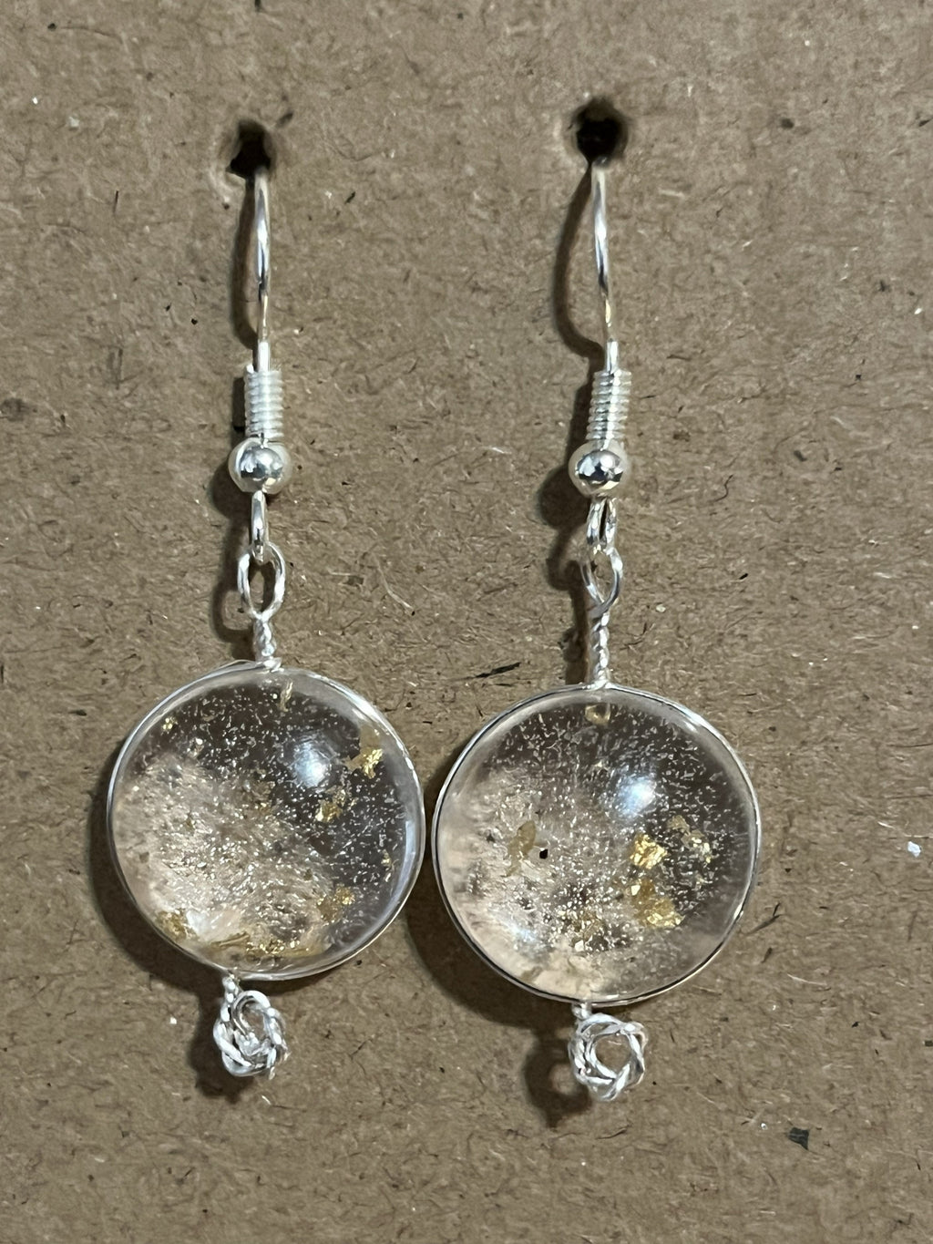 Clear gold flake resin earrings.
