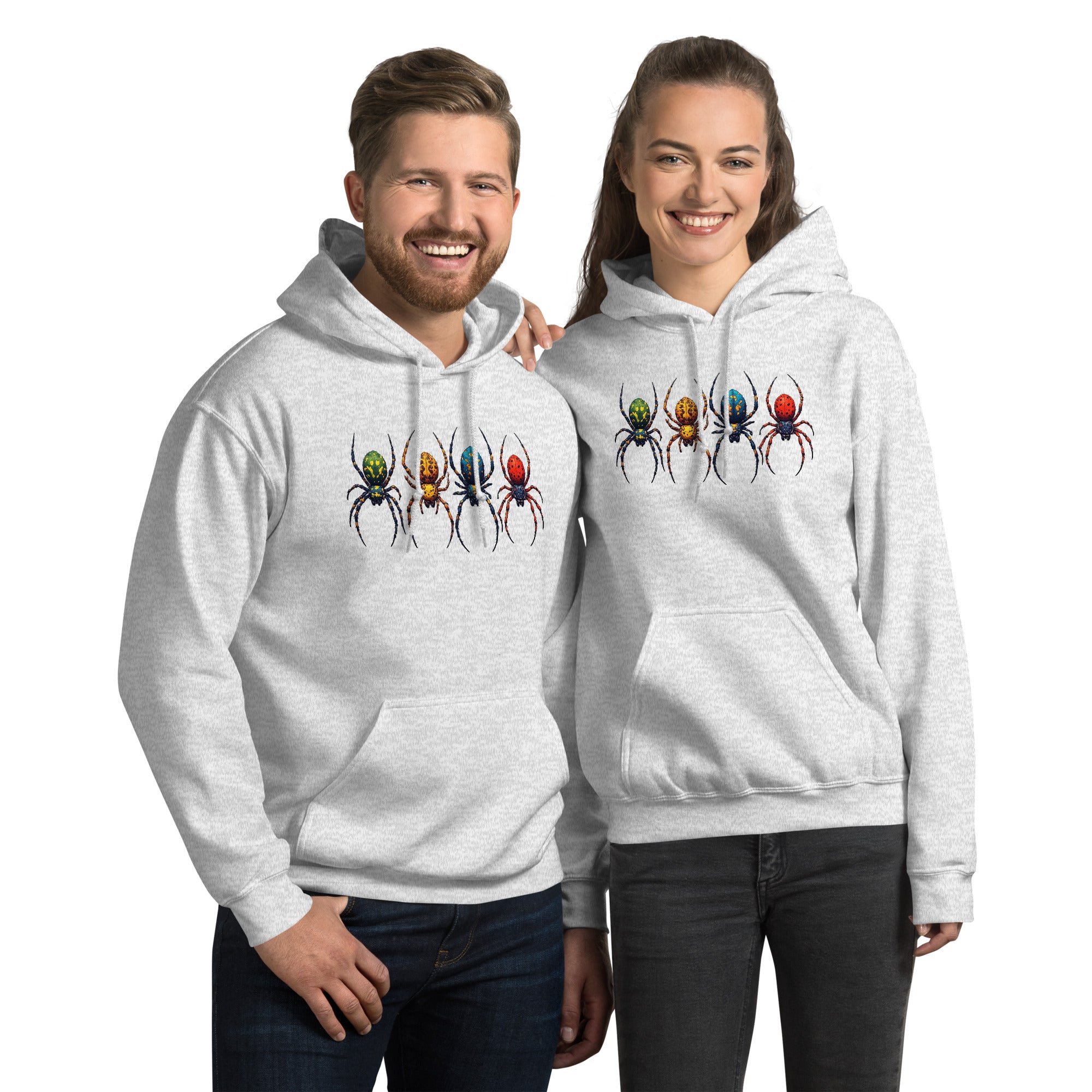 A man and a woman modeling matching light grey hoodies with a graphic of four colorful spiders across the chest, set against a plain white background.