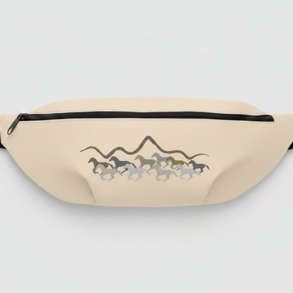 Beige waist bag with graphic design worn by a person in gray clothing.