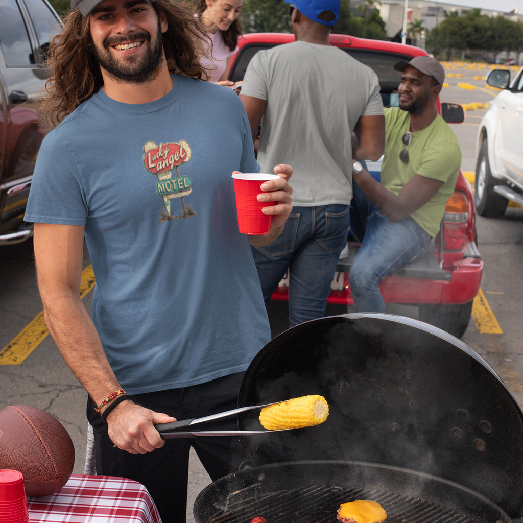 Retro Motel Sign Style Design On T-shirt a man grilling at a tailgate party. 
