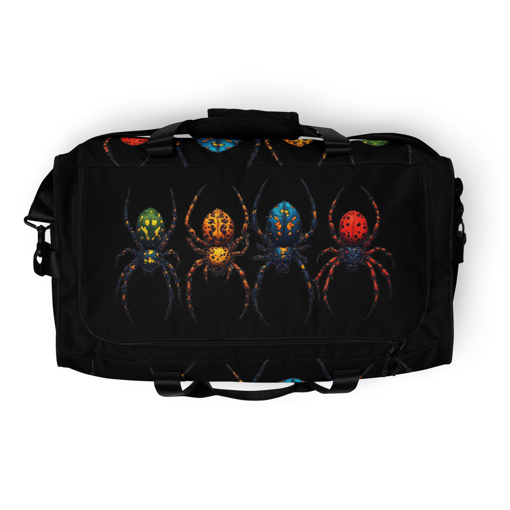 A black duffel bag featuring a graphic print of four stylized spiders in green, orange, blue, and red on the front pocket, shown against a plain white background.