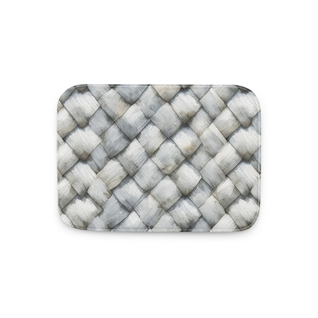 Memory foam bath mat with a photorealistic grey and white herringbone woven texture print for a modern bathroom.