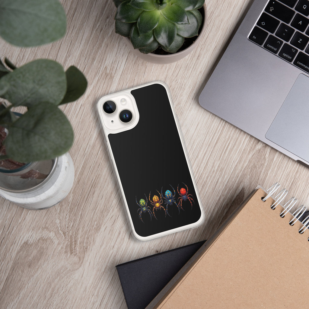 Iphone case with a color spider design laying on black desk with a pen watch a eye glasses laying next to the Iphone.