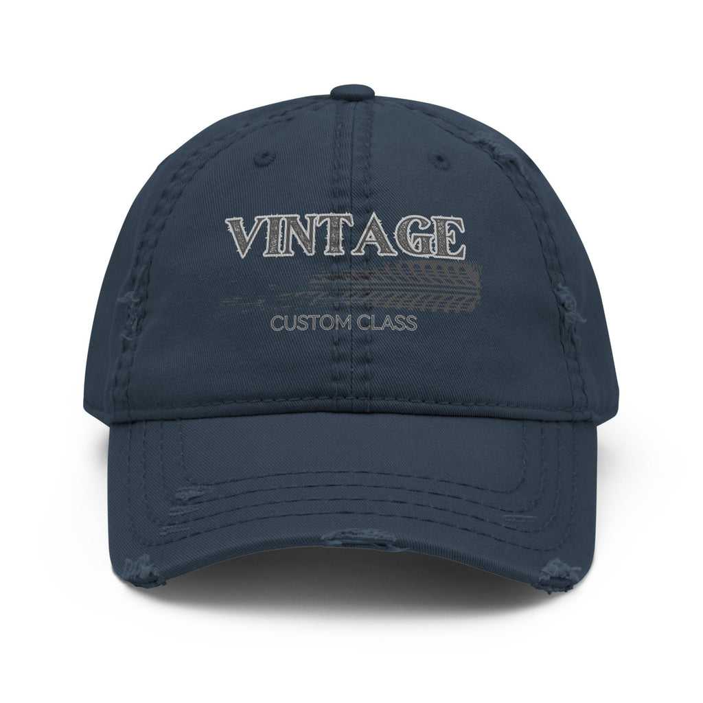 Navy blue cap with 'VINTAGE CUSTOM CLASS' text on a white background.