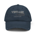 Navy blue cap with 'VINTAGE CUSTOM CLASS' text on a white background.