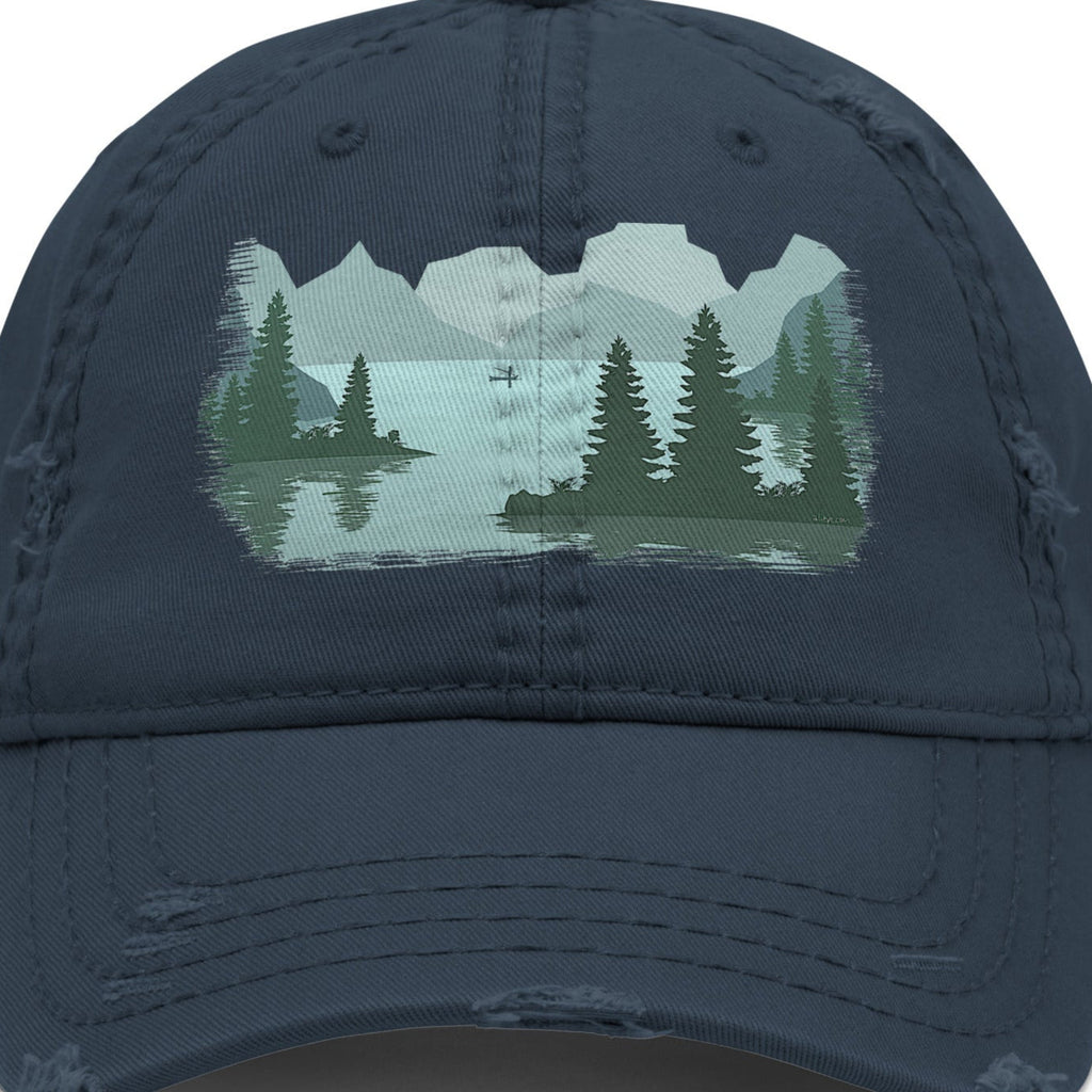 Distressed dad hat with full-color fisherman in a boat lake scene graphic printed on the front panel, charcoal gray structured low-profile cap with adjustable back strap. 