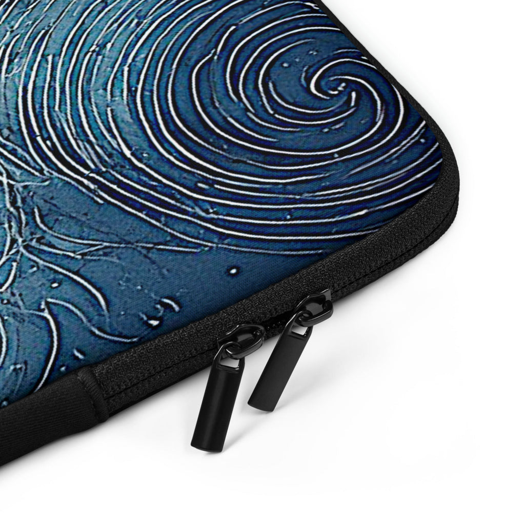 Close-up of a laptop sleeve featuring a blue and black spiral wave pattern with black zipper pulls and black trim, shown on a white background.