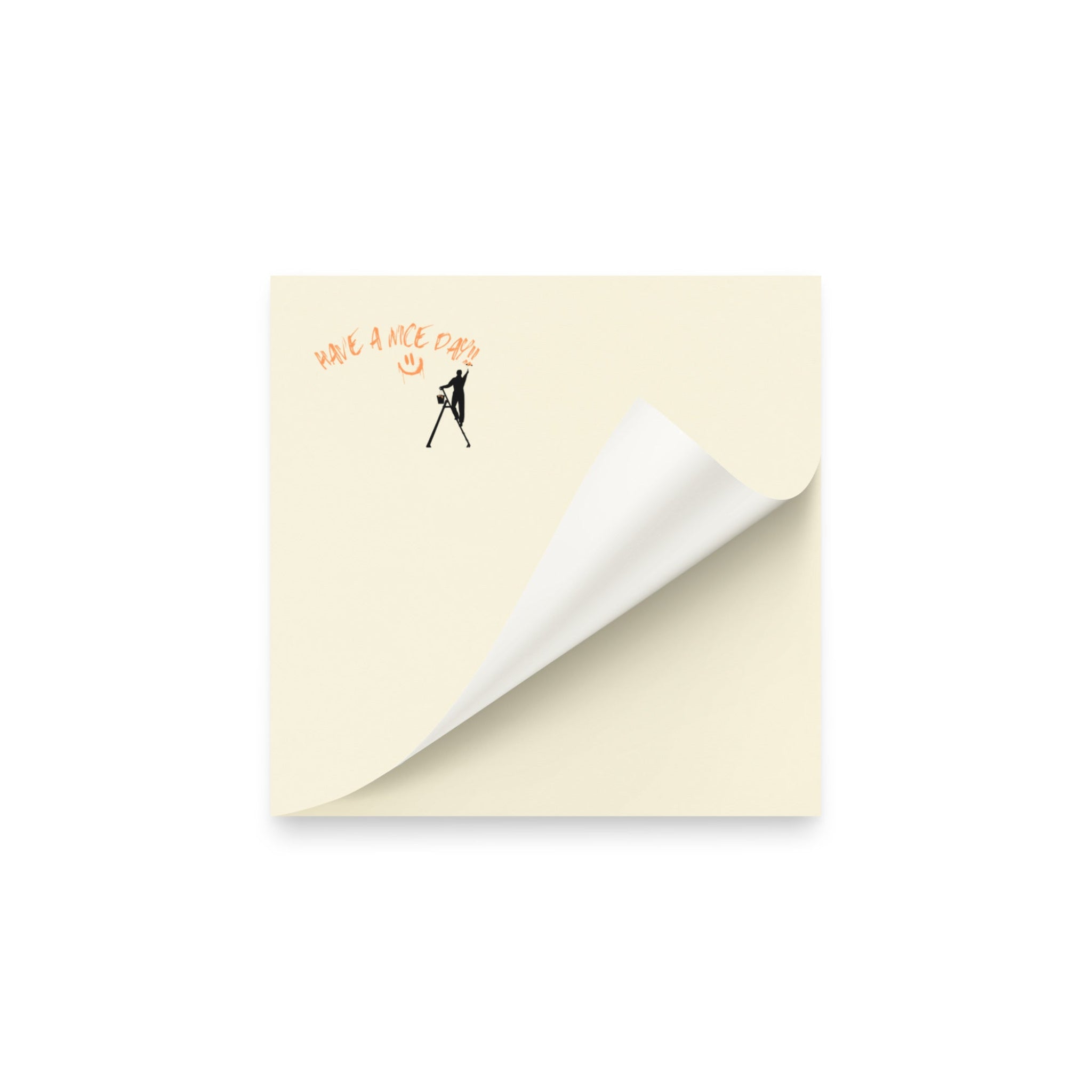 Beige post it sticky note pad with black silhouette and text 'Have a nice day' on a white background