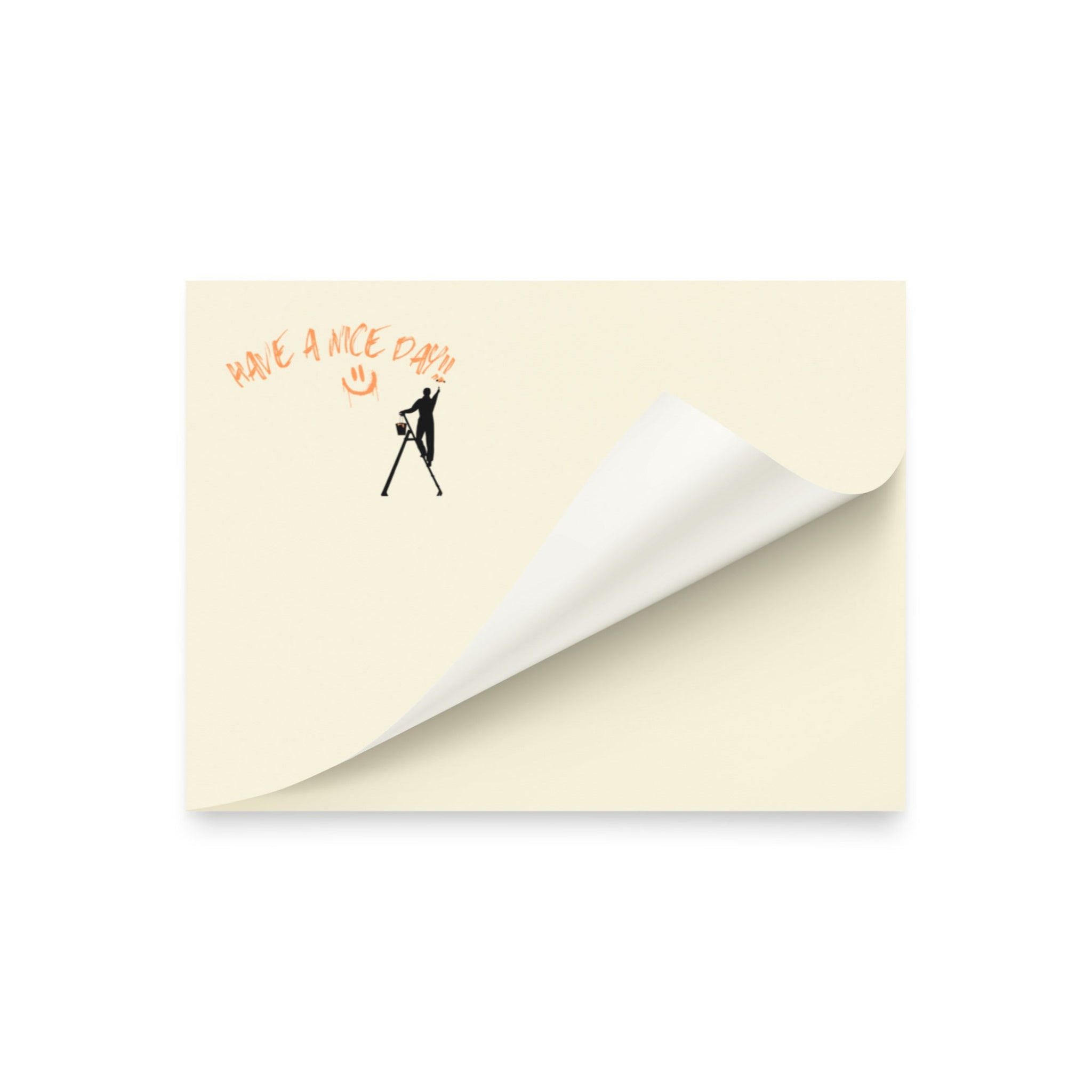 Beige post it sticky note pad with black silhouette and text 'Have a nice day' on a white background