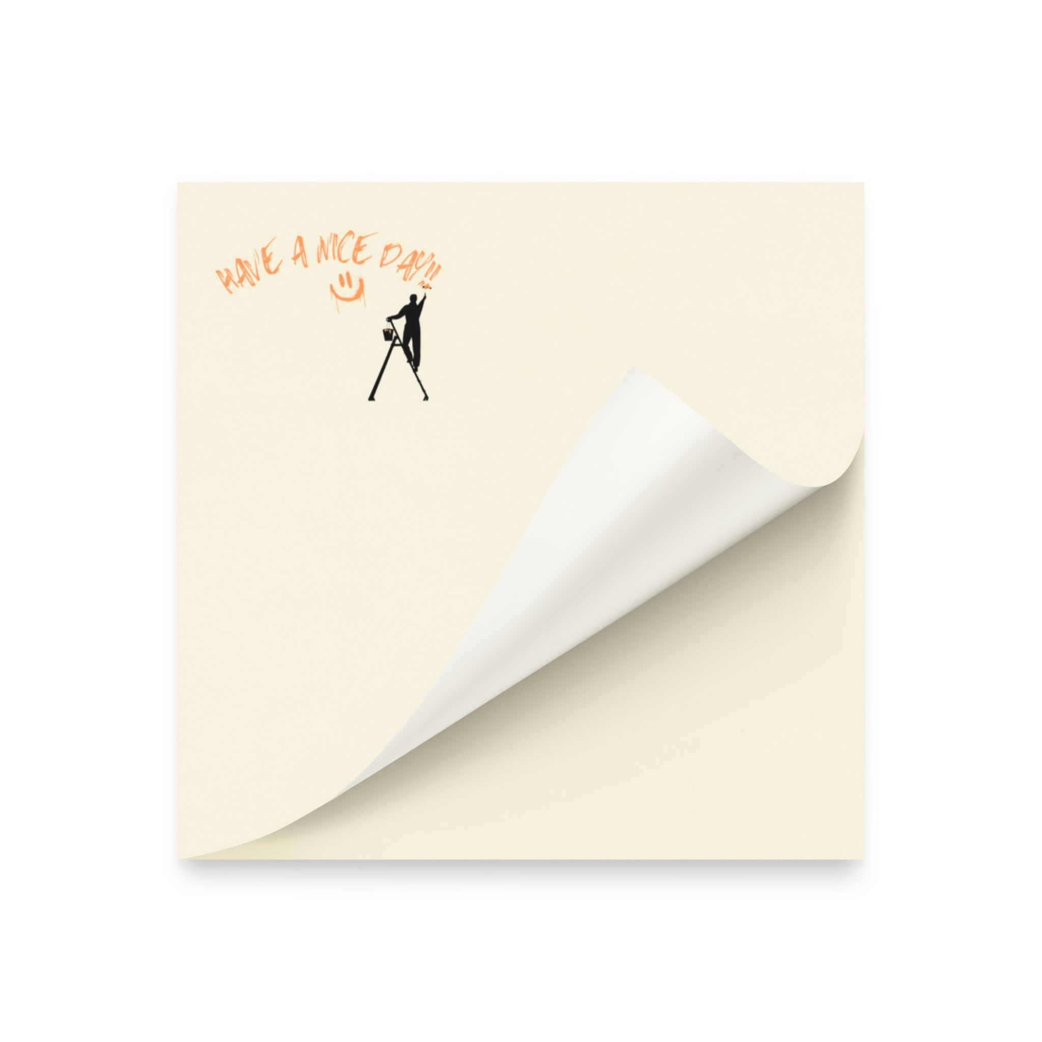 Beige post it sticky note pad with black silhouette and text 'Have a nice day' on a white background