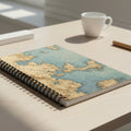 Notebook with world map design on a white background
