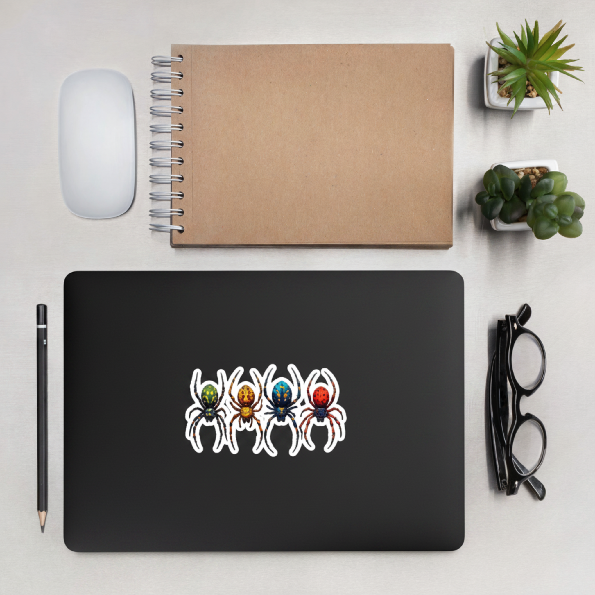Spider Stickers on Matte Black Laptop