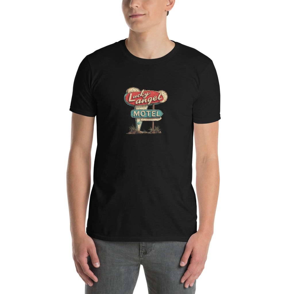 Man wearing a black t-shirt with Vintage style Route 66 motel sign on a white background. 
