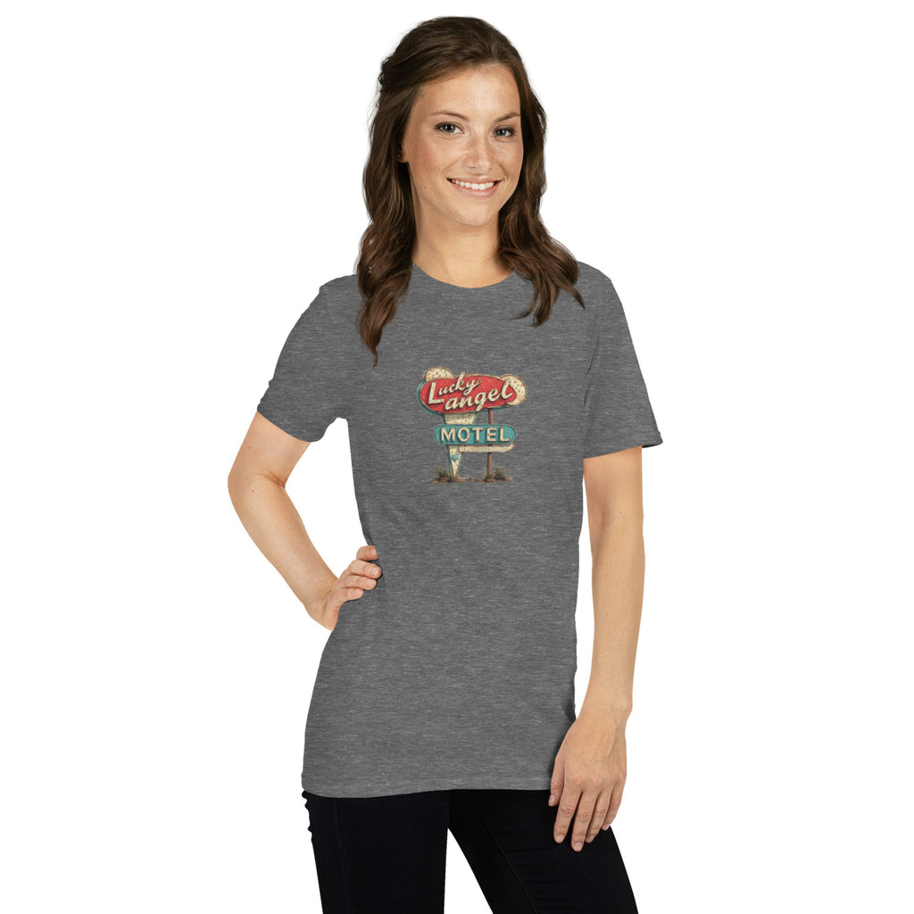 Woman wearing a grey t-shirt with Vintage style Route 66 motel sign on a white background. 