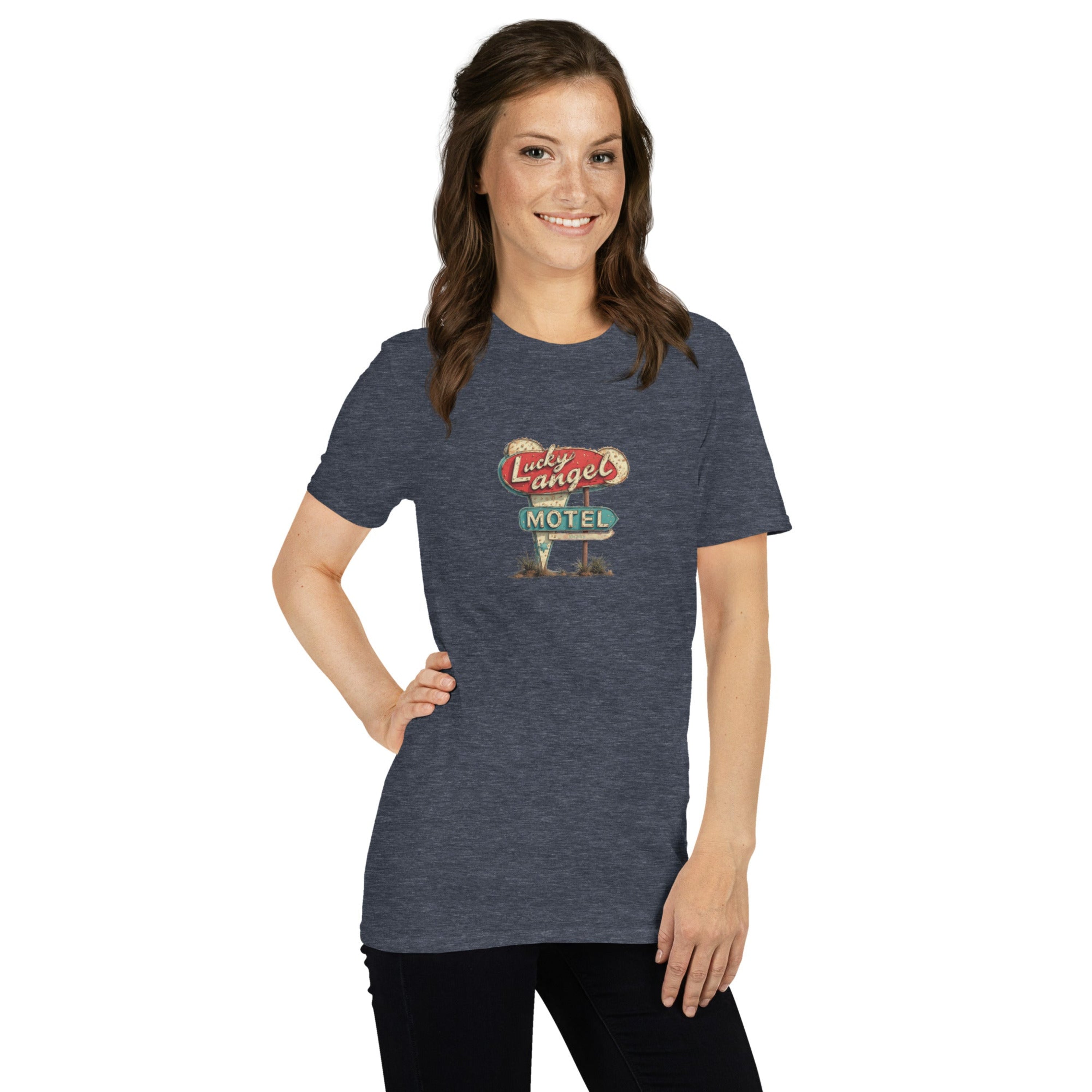 Woman wearing a blue t-shirt with a vintage motel sign design on a white background.