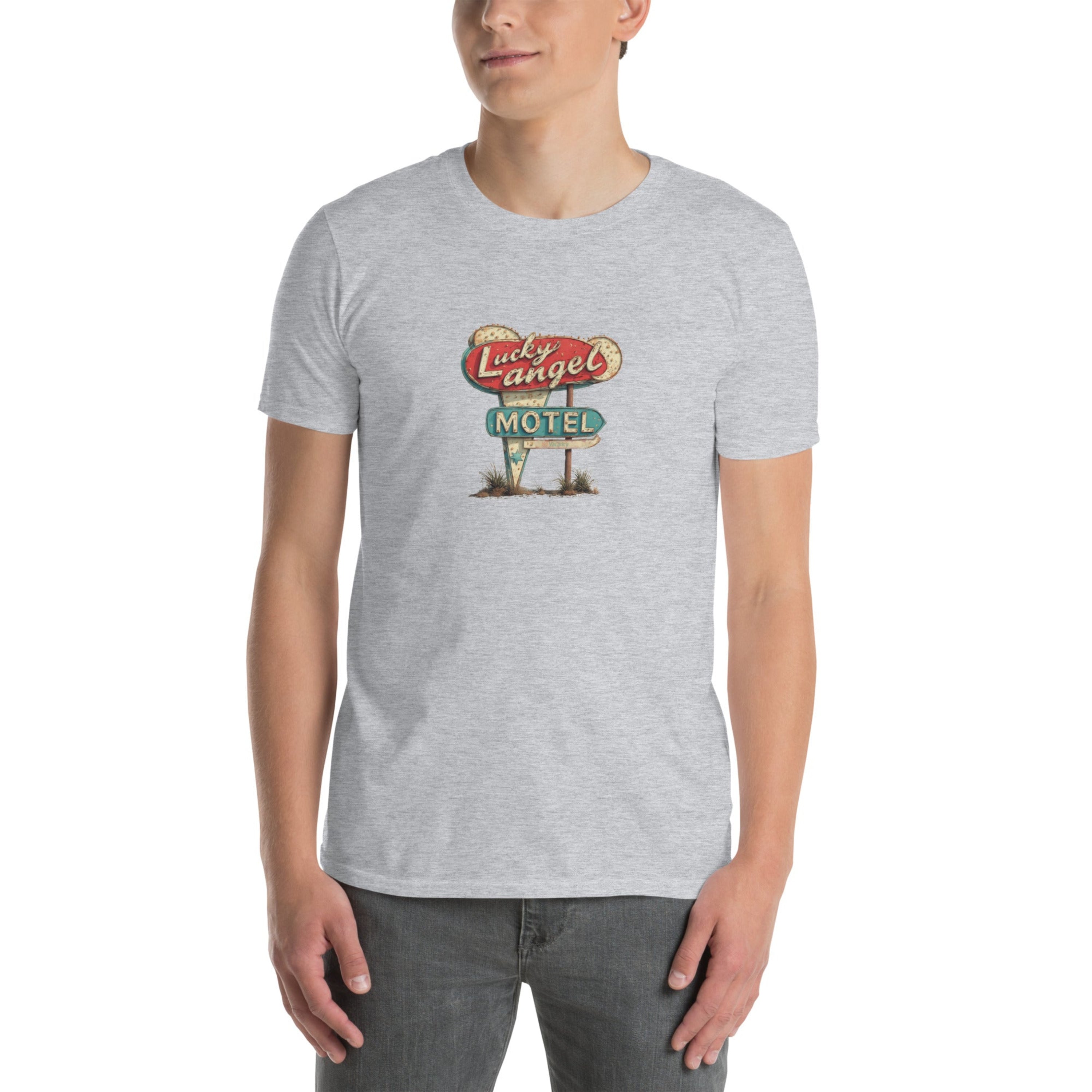 Person wearing a gray t-shirt with a vintage motel sign graphic on a white background.