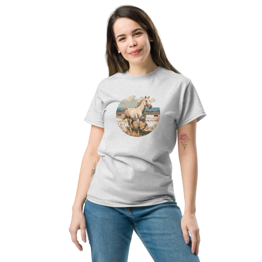 Woman wearing a gray t-shirt with a colorful graphic design on a white background