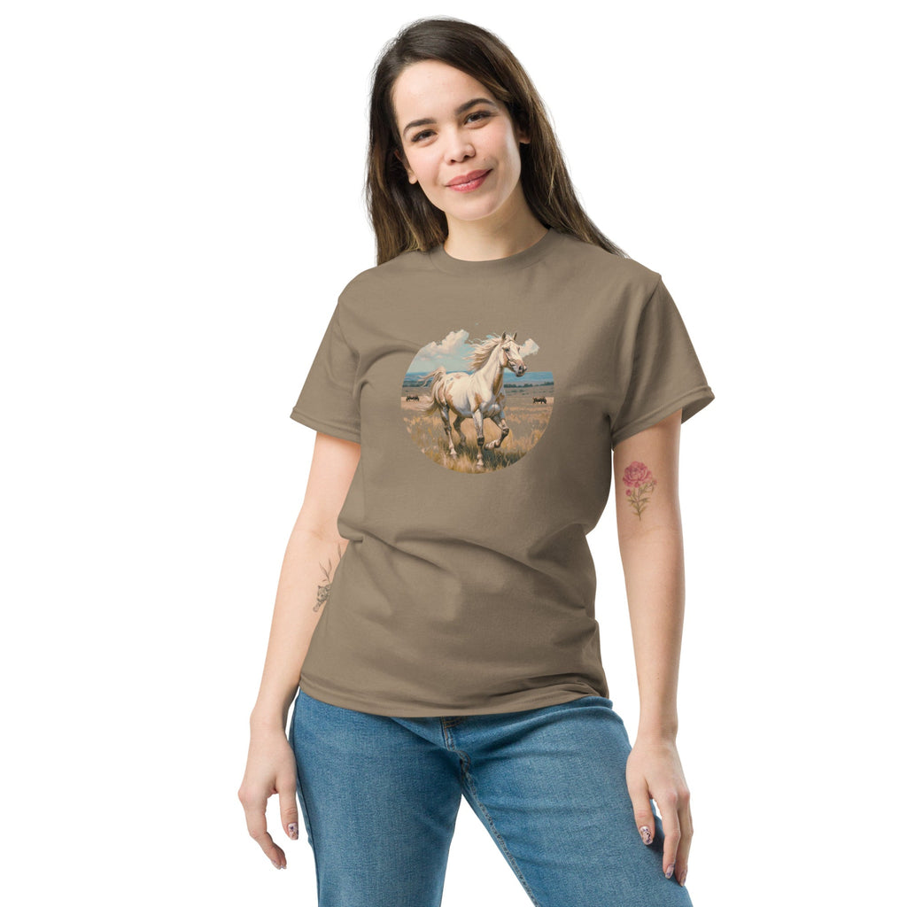 A person wearing a brown t-shirt with a vintage-style illustration of an American Paint Horse running free, perfect for Western and equestrian fashion.