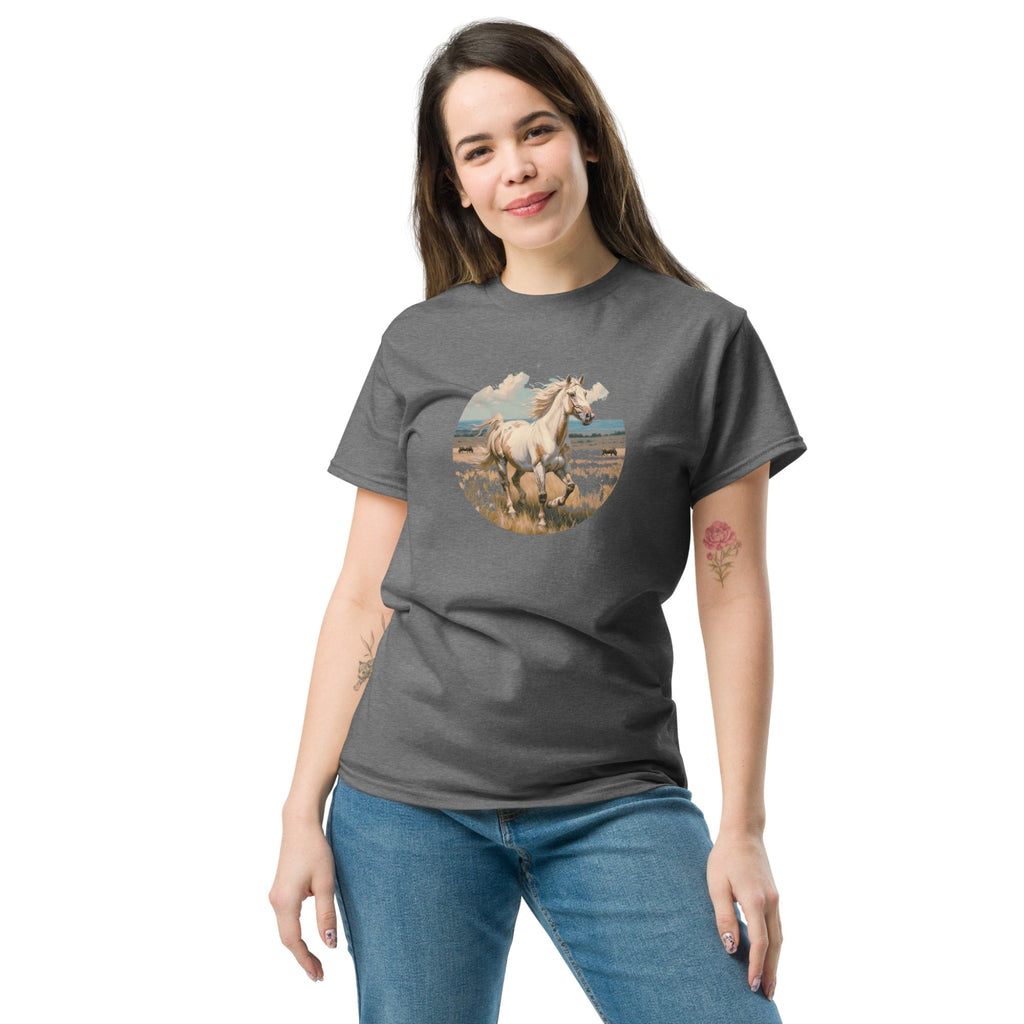 A person wearing a grey t-shirt with a vintage-style illustration of an American Paint Horse running free, perfect for Western and equestrian fashion.