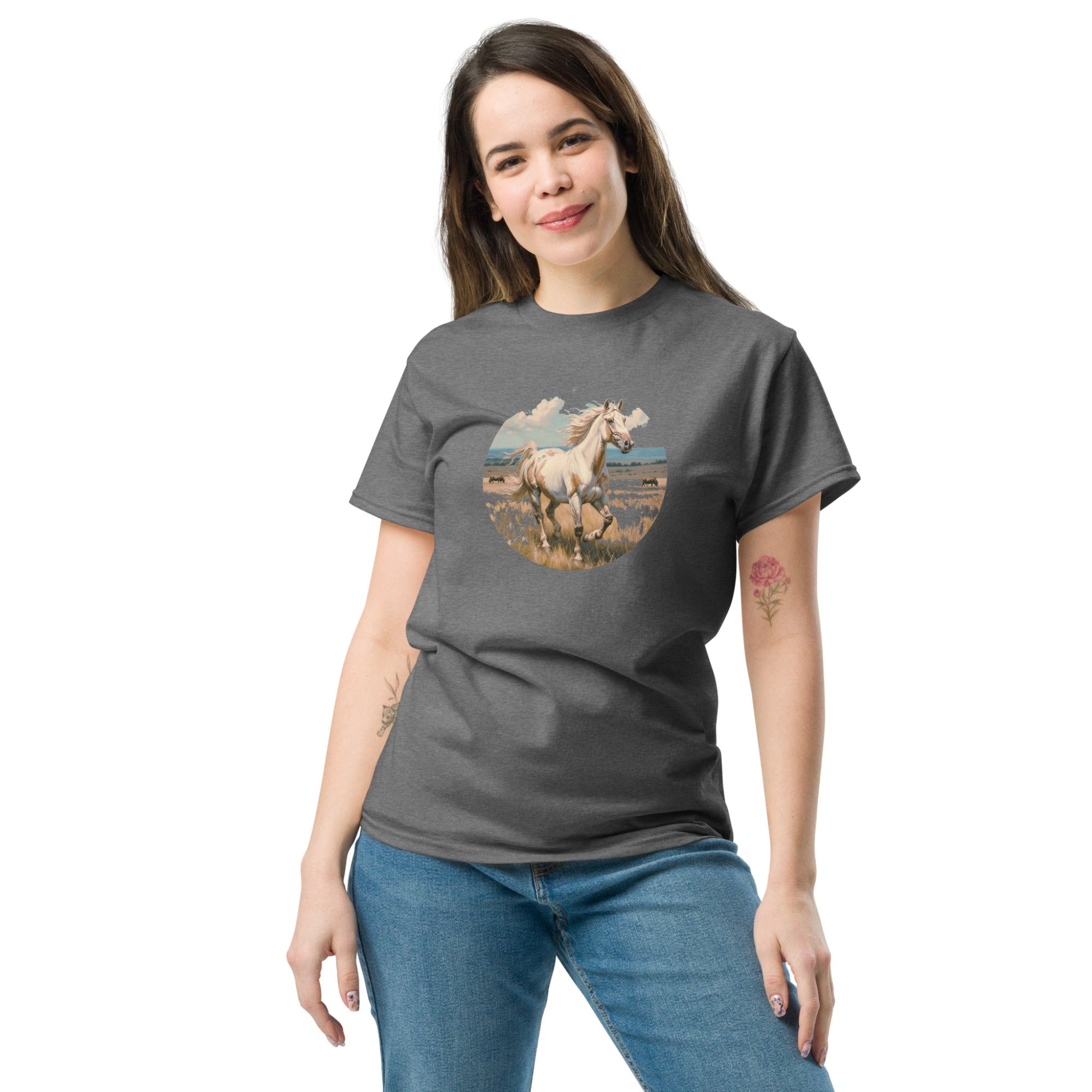 A person wearing a grey t-shirt with a vintage-style illustration of an American Paint Horse running free, perfect for Western and equestrian fashion.