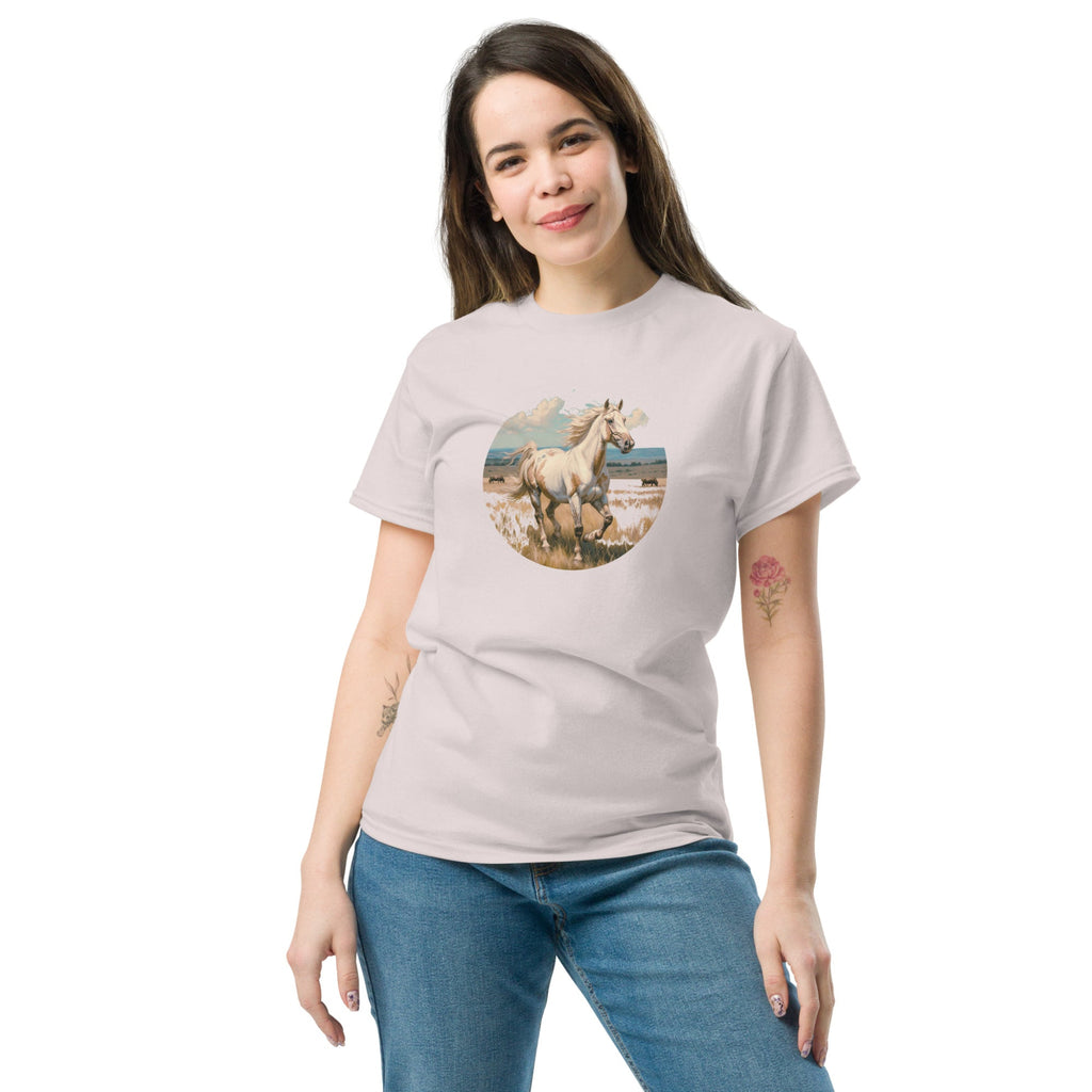 A person wearing alight grey t-shirt with a vintage-style illustration of an American Paint Horse running free, perfect for Western and equestrian fashion.