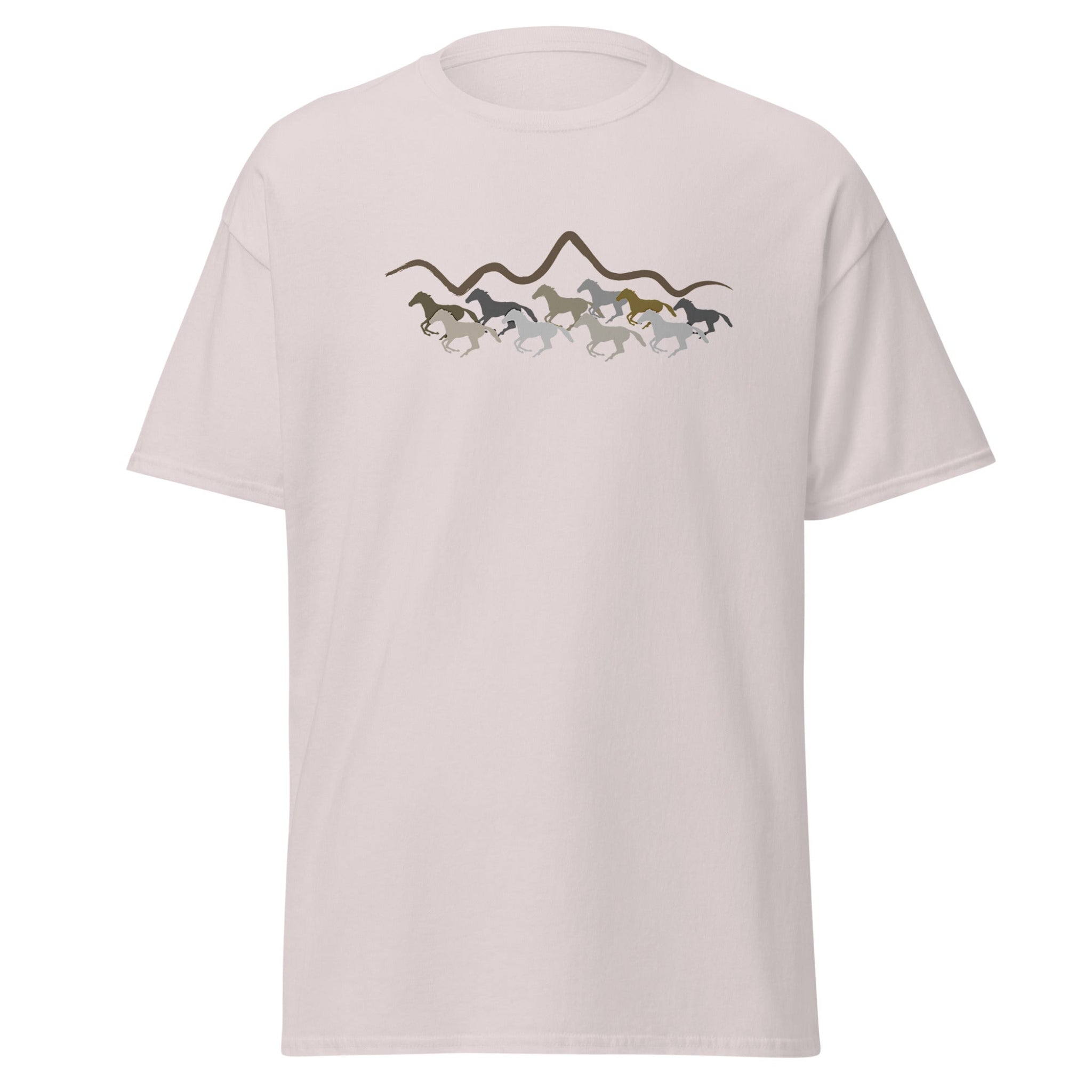 Light beige unisex t-shirt with a running wild horses and mountain silhouette graphic design in earth tones, laid flat on a white background
