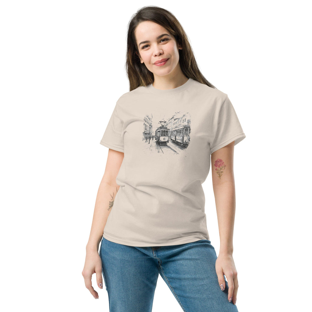Woman wearing a natural color t-shirt with a tram sketch design on a white background