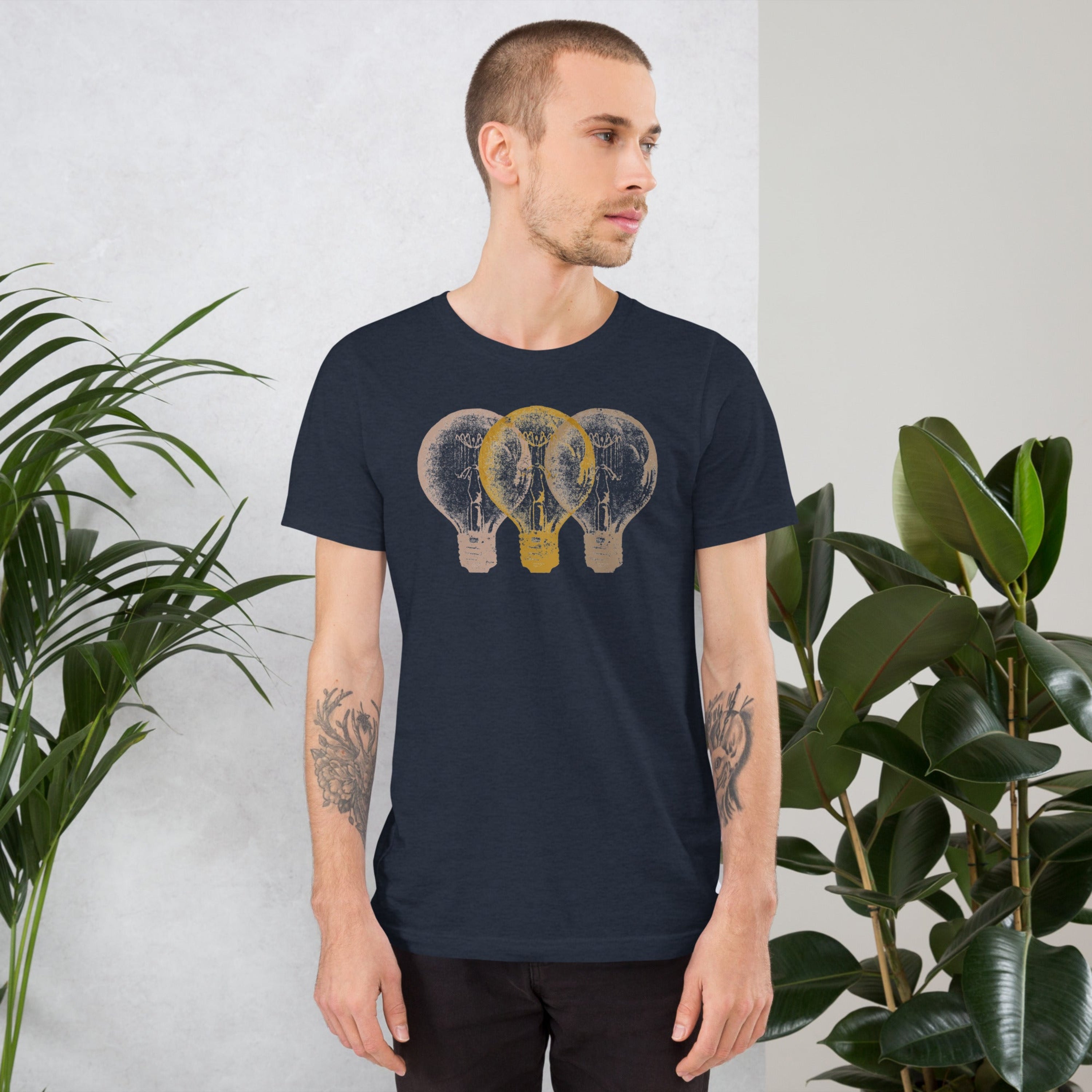 A man wearing Vintage Edison light bulb graphic t-shirt, unisex fit.