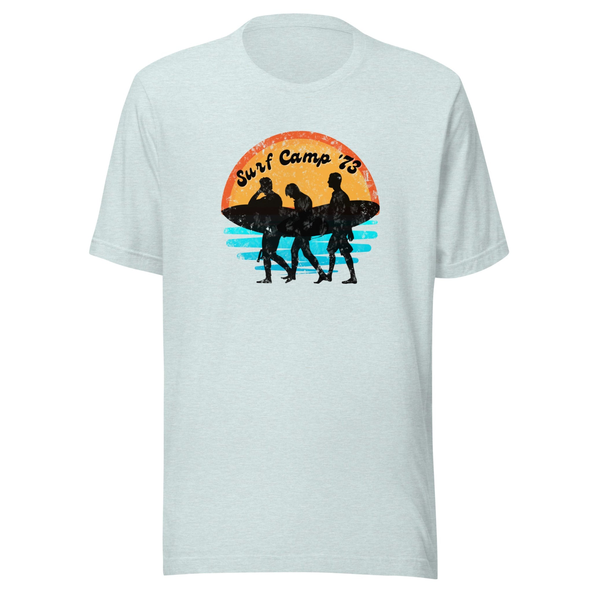Light blue t-shirt with a graphic of three surfers and 'Surf Camp 73' text on a white background.