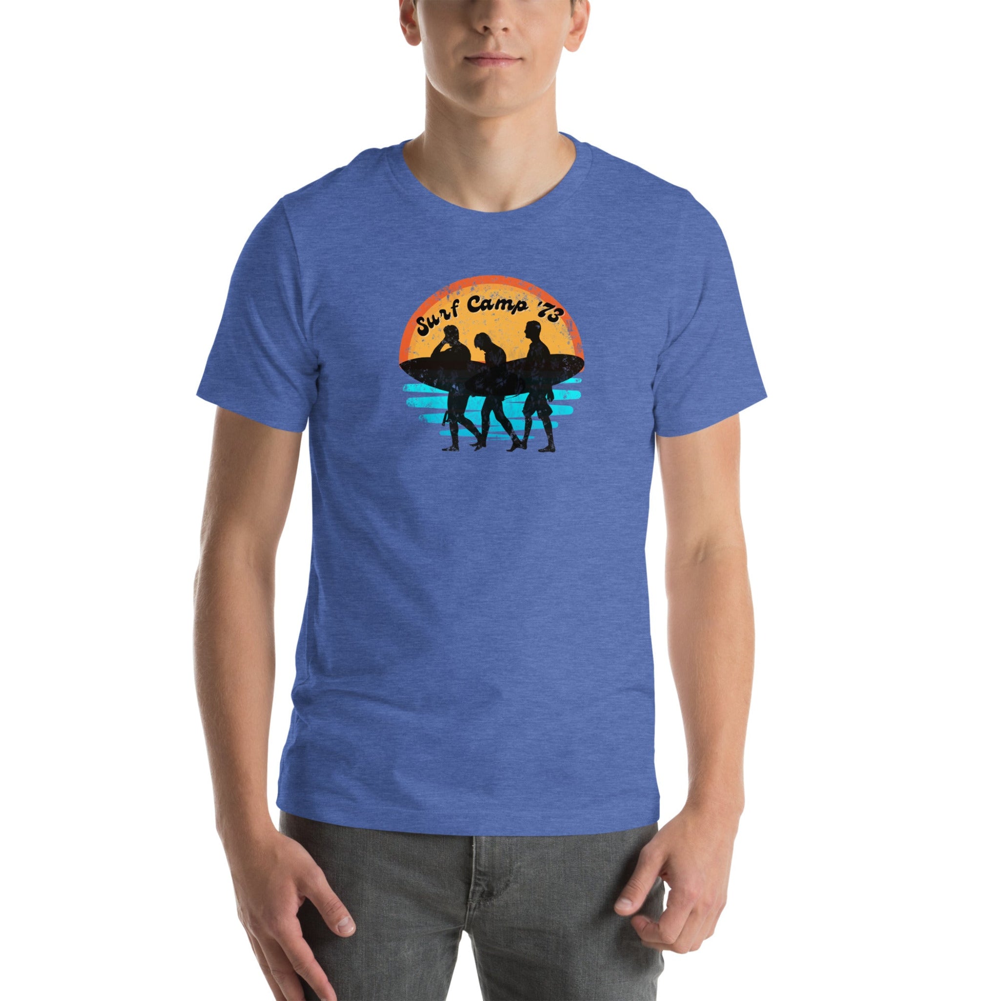 Person wearing a blue t-shirt with a graphic design on a white background.