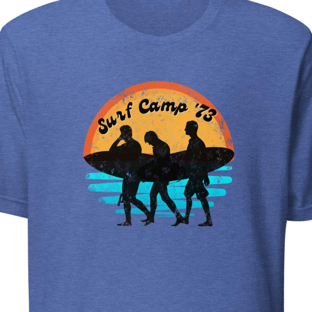 Blue t-shirt with 'Surf Camp 73' graphic on a white background.