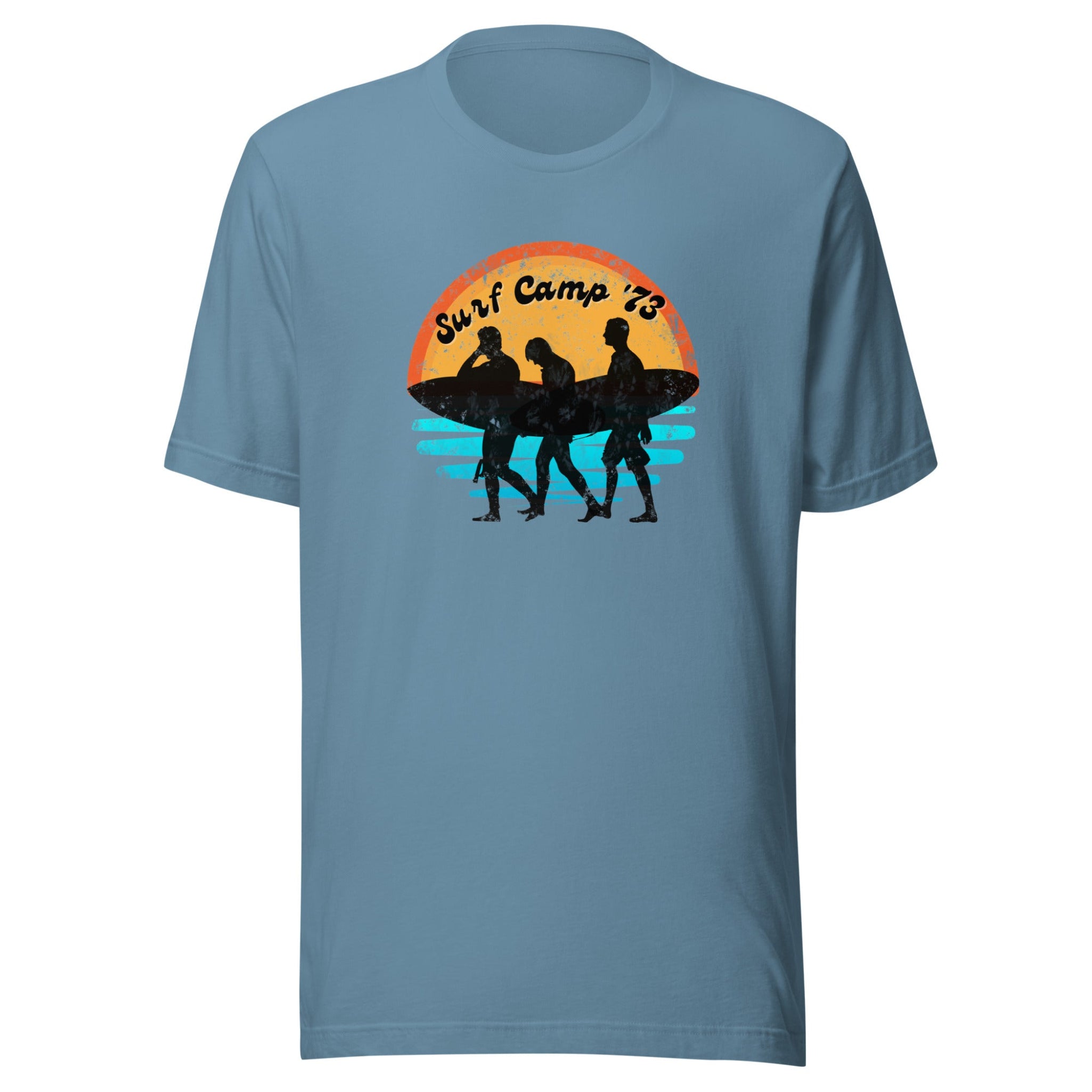 Blue t-shirt with a graphic of three silhouettes holding surfboards and 'Surf Camp 73' text on a white background.