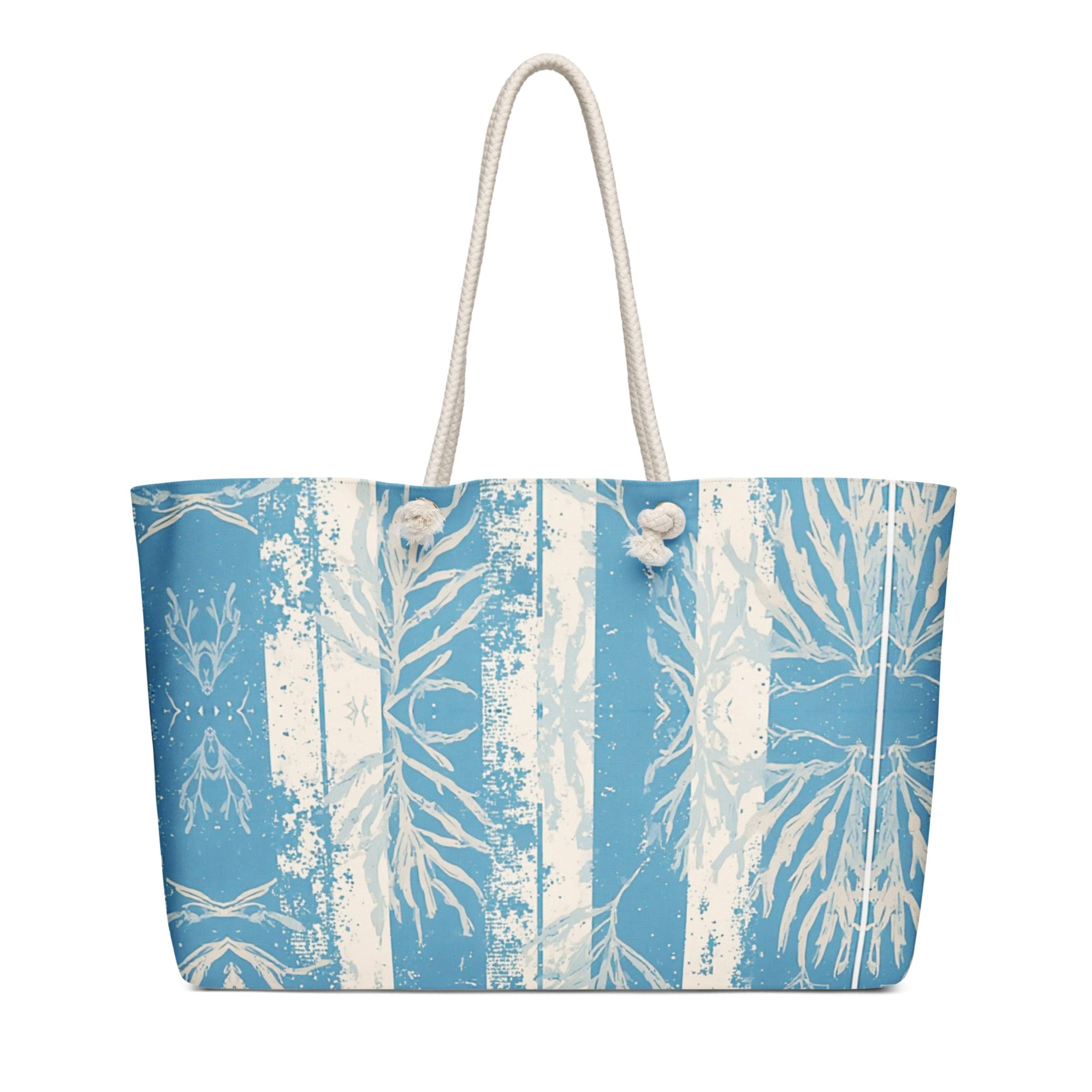 Tote bag with blue and white abstract design on a white background