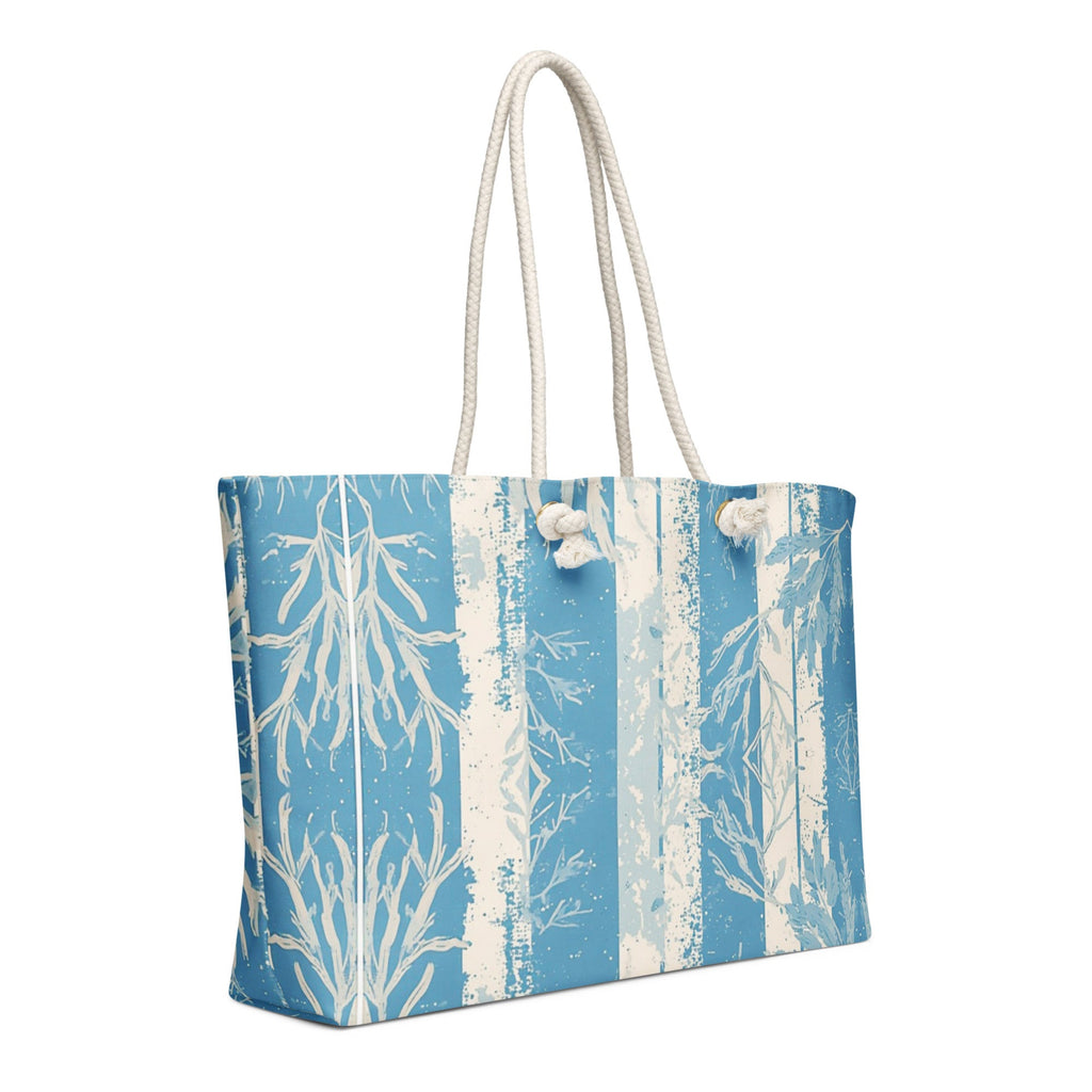 Tote bag with a blue and white coastal   design on a white background. 