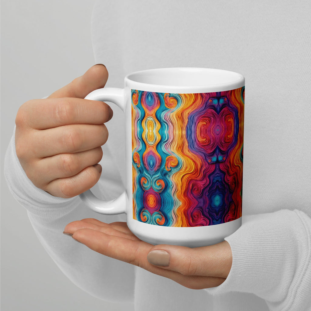  holding a multicolored ceramic coffee mug