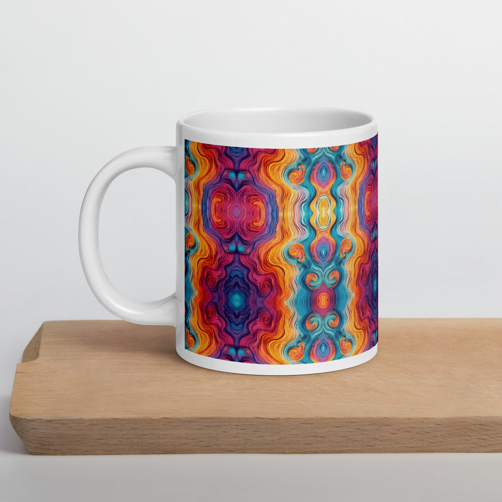 Multicolored ceramic coffee cup on wood table