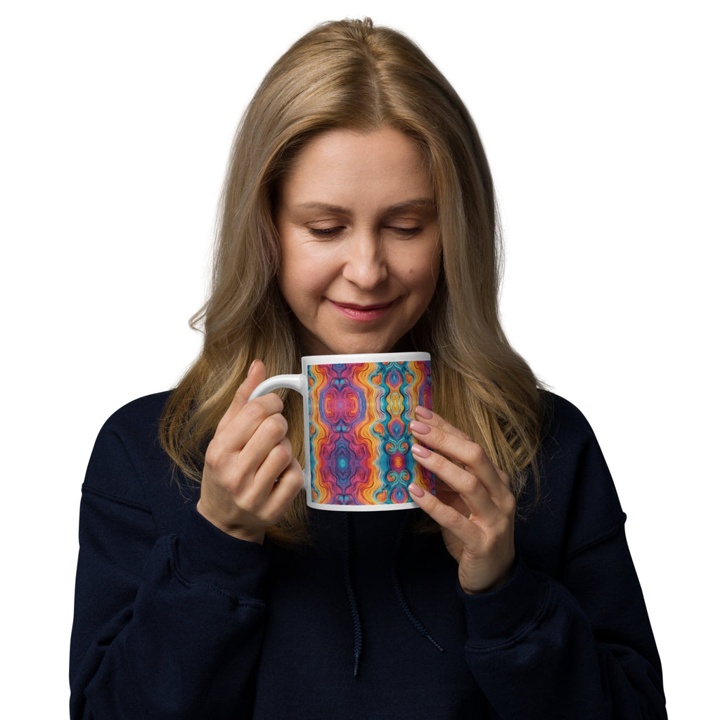 Woman holding a multicolored ceramic coffee mug