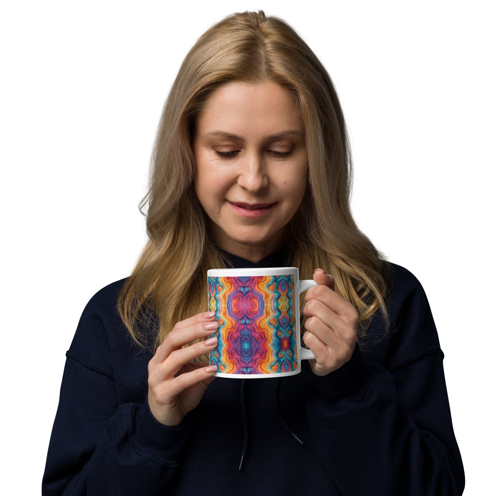Woman holding a multicolored ceramic coffee mug wearing a black long sleeve shirt.