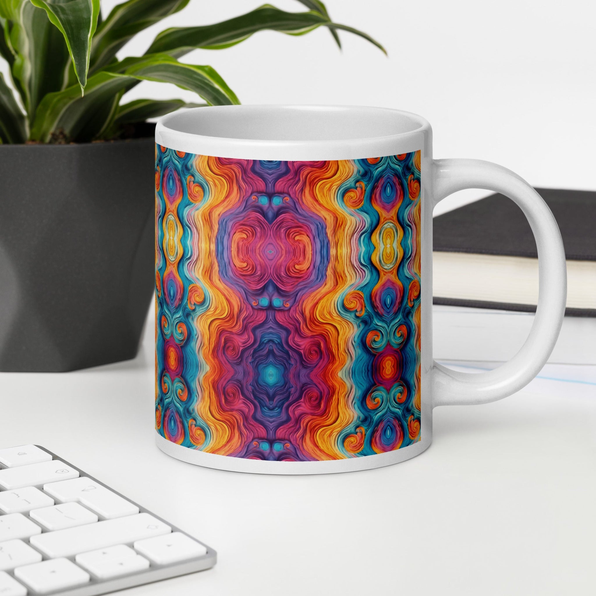 Multicolored ceramic coffee cup on white table