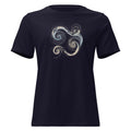 Close-up of a black t-shirt featuring a blue and gold Celtic Triskelion spiral design.
