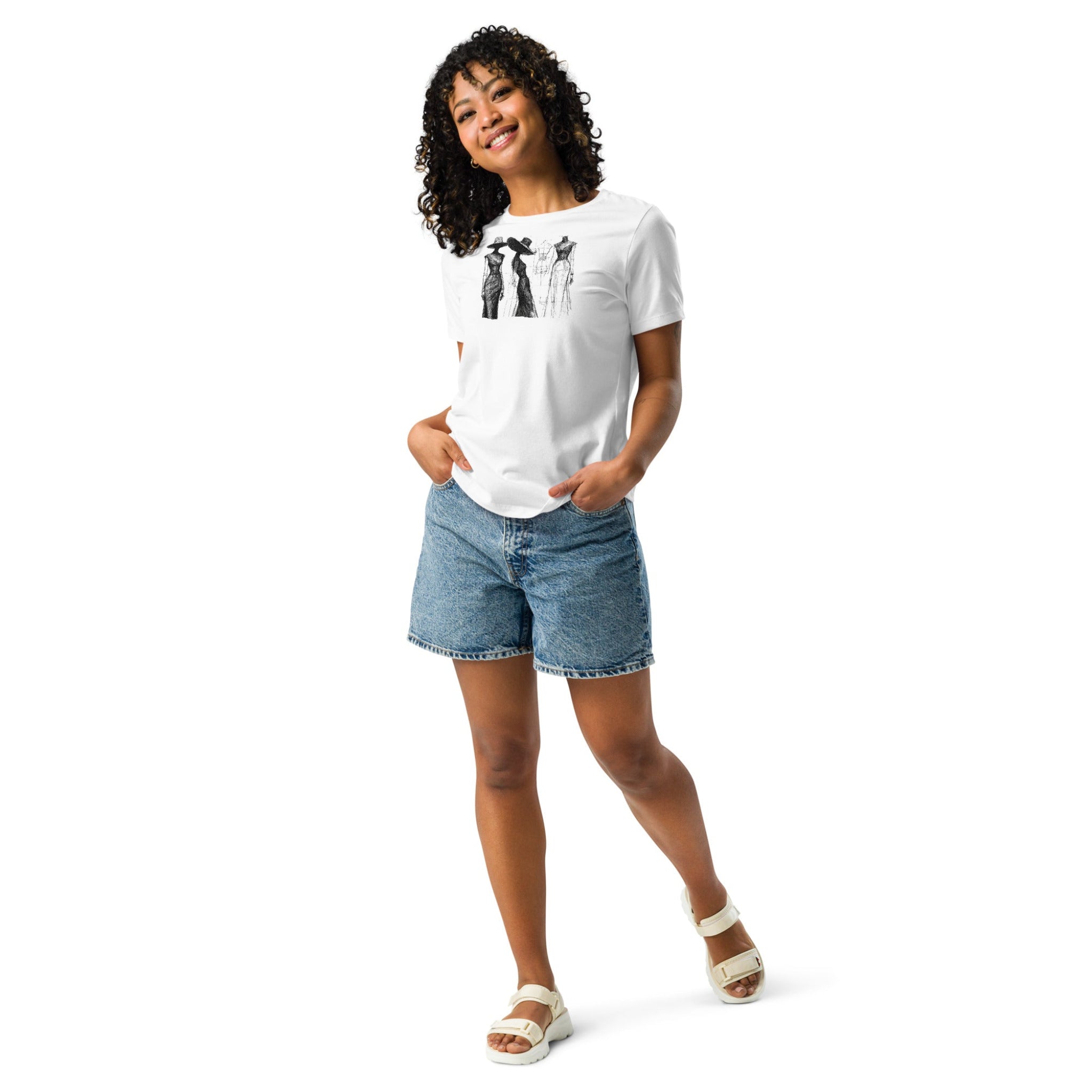 Woman wearing a white t-shirt with a an vintage style fashion sketch design, paired with denim shorts on a white background.